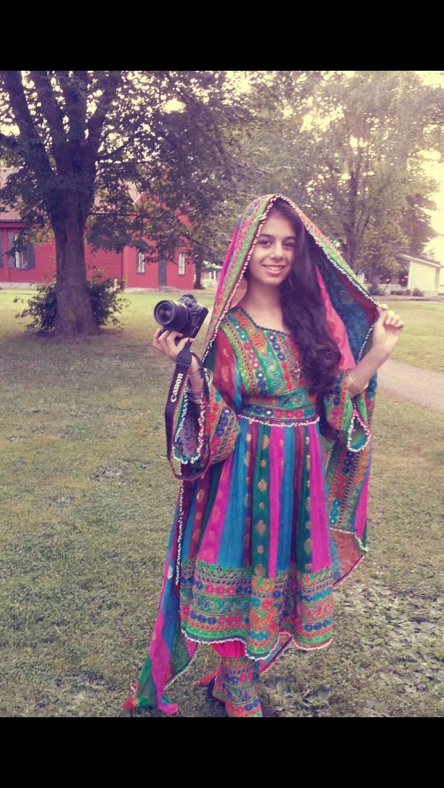 عکس دختر افغانی با لباس محلی